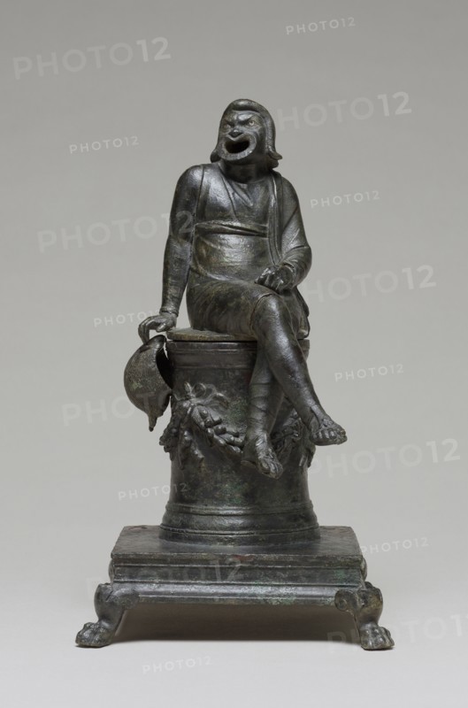 Incense Burner Shaped as a Comic Actor Seated on an Altar; Roman Empire; first half of 1st century; Bronze with silver inlay