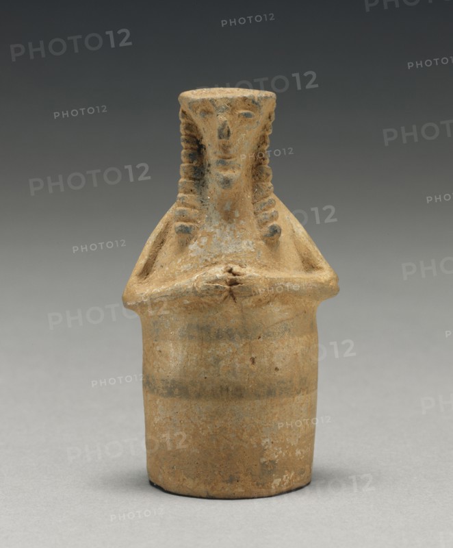 Oil Container in the Shape of a Woman; Crete, Greece; first half of 7th century B.C; Terracotta; 7.6 × 4.1 × 3 cm