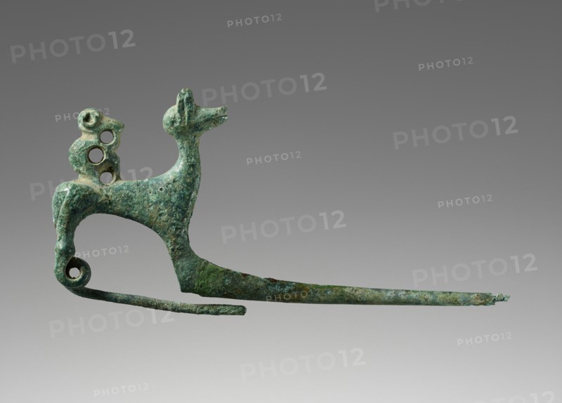 Pin Shaped as a Dog with a Monkey; Etruria; 700–650 B.C; Bronze; 3.8 × 7.6 × 2 cm, 1 1,2 × 3 × 13,16 in