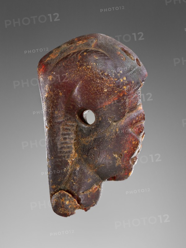 Pendant: Winged Female Head in Profile; Italy; 525 - 480 B.C; Amber; 79 × 49 × 25 mm, 3 1,8 × 1 15,16 × 1 in