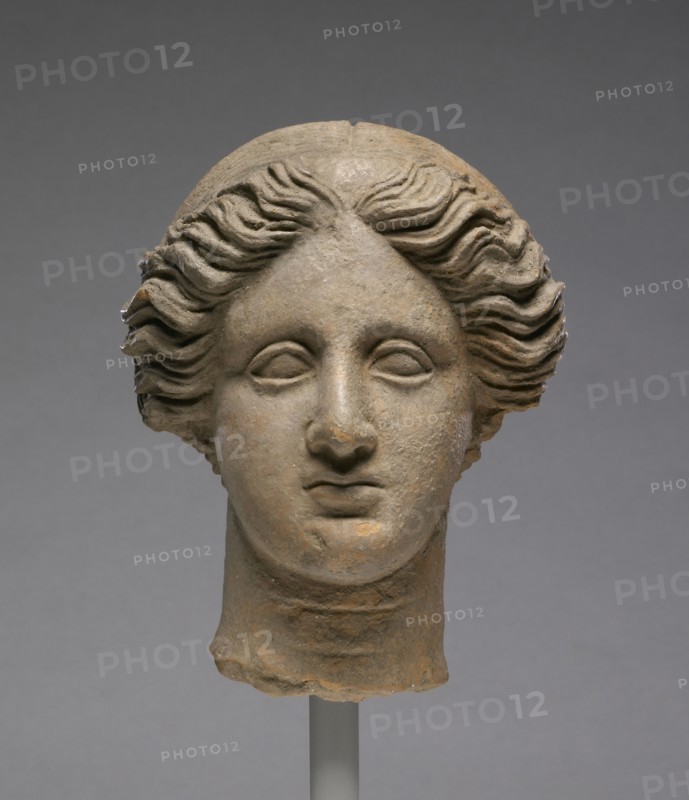 Head of a Woman; Tarentum, Taras, South Italy; about 350 B.C; Terracotta; 17.8 × 14.1 cm, 7 × 5 9,16 in