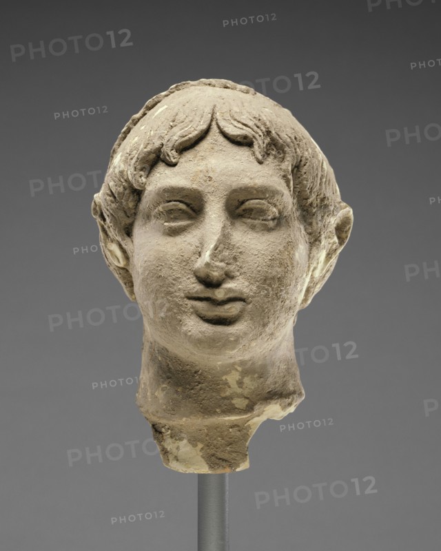 Head of a Male Banqueter; Tarentum, Taras, South Italy; 400 - 300 B.C; Terracotta with clay slip and polychromy, red color