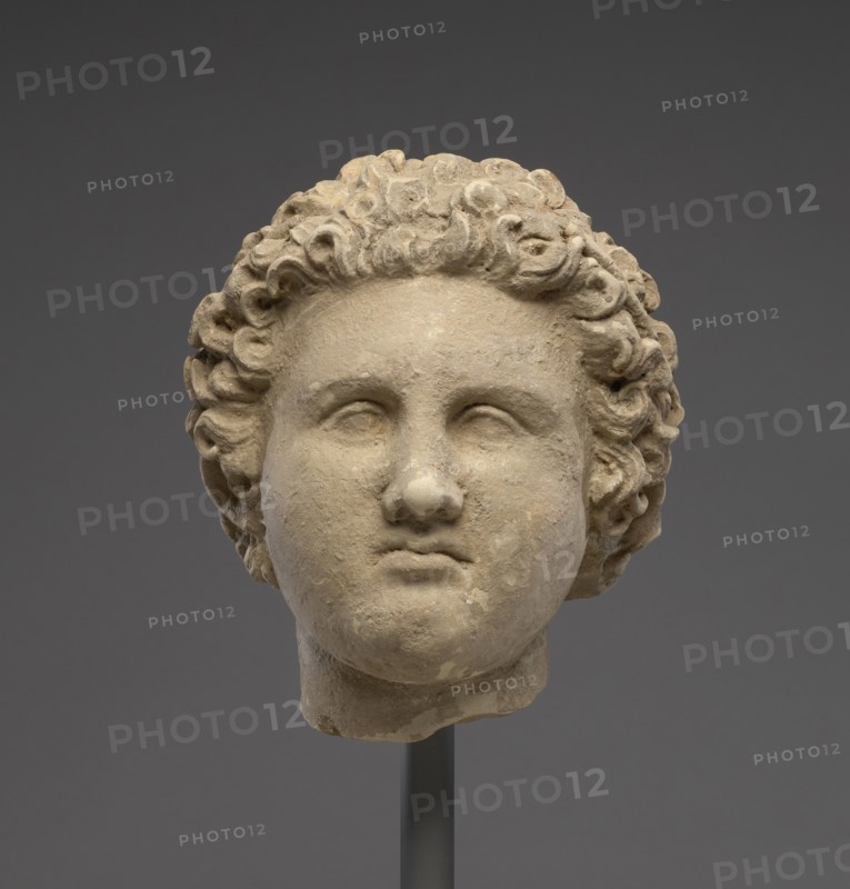 Head of a Man; Tarentum, Taras, South Italy; 325 - 275 B.C; Terracotta with white slip and polychromy, red, 17.1 × 14.3 cm