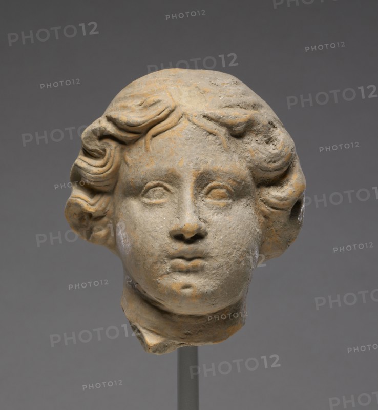 Head of a Woman; Tarentum, Taras, South Italy; 350 - 300 B.C; Terracotta; 12 × 10.3 cm, 4 3,4 × 4 1,16 in
