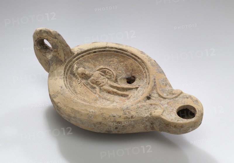 Lamp; North Africa, Tunisia; 1st - 2nd century; Terracotta; 12.2 x 4.9 x 7 cm, 4 13,16 x 1 15,16 x 2 3,4 in