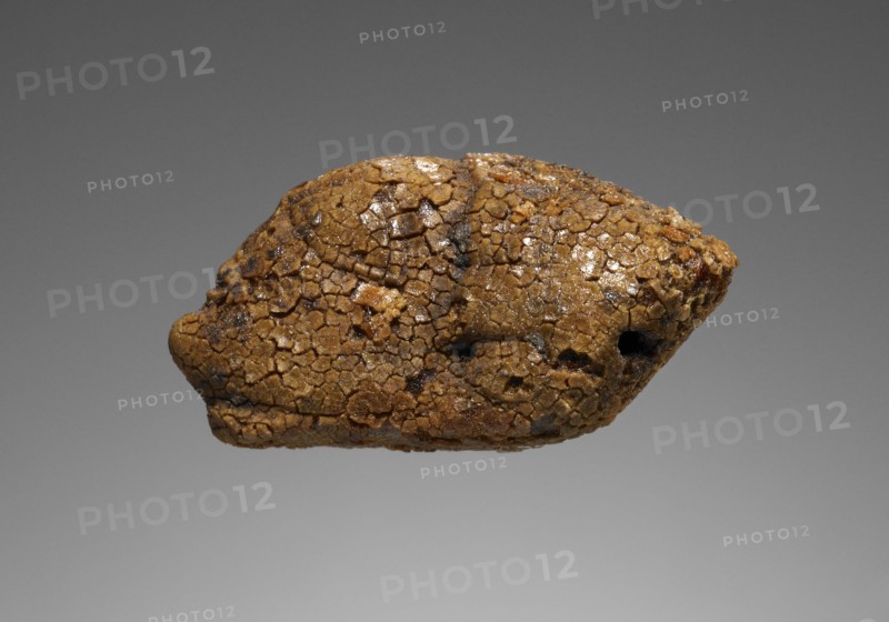 Pendant: Female Head; Italy; 425 - 400 B.C; Amber; 40 × 23 × 16 mm, 1 9,16 × 7,8 × 5,8 in