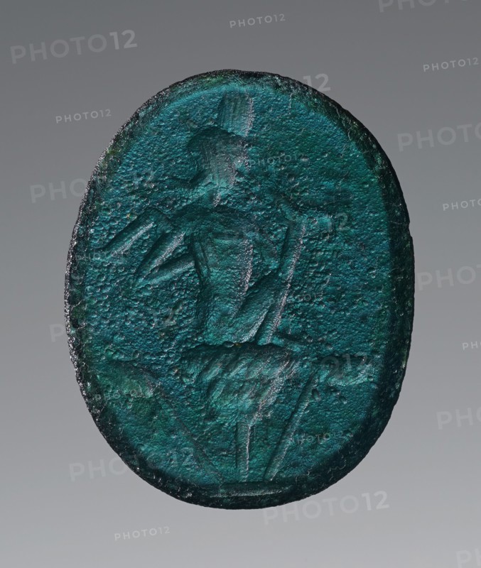 Engraved Gem, Roman Empire; 2nd - 4th century; Greenish-blue glass; 2 × 1.6 cm, 13,16 × 5,8 in