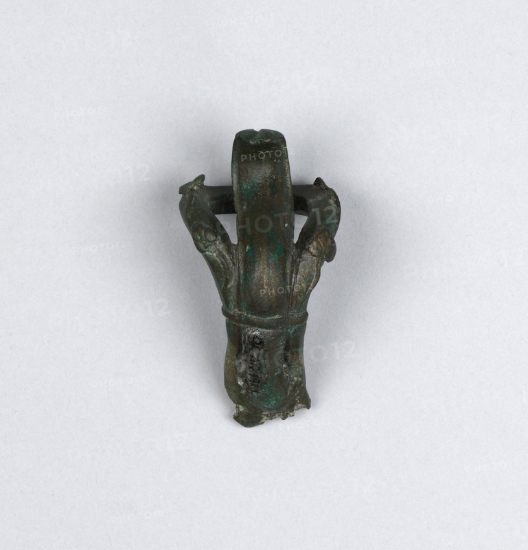 Lamp in the Shape of a Comic Mask; Roman Empire; 75 - 125; Bronze; 6.9 × 12.5 cm, 2 11,16 × 4 15,16 in