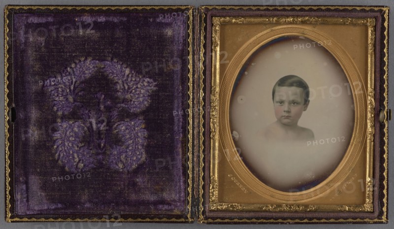 Vignette portrait of a Young Boy; Jeremiah Gurney, American, 1812 - 1895, about 1852 - 1857; Daguerreotype, hand-colored