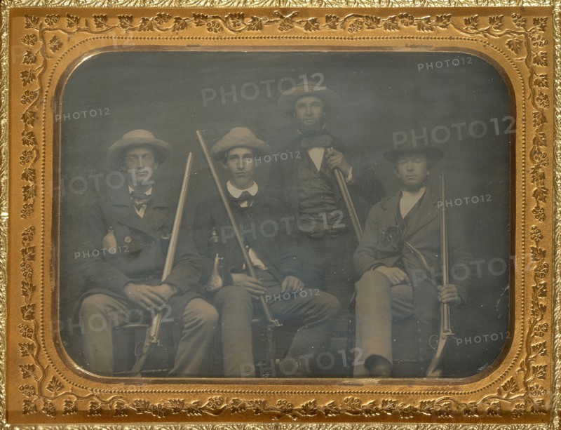 Portrait of four men with rifles; American; 1850s; Daguerreotype
