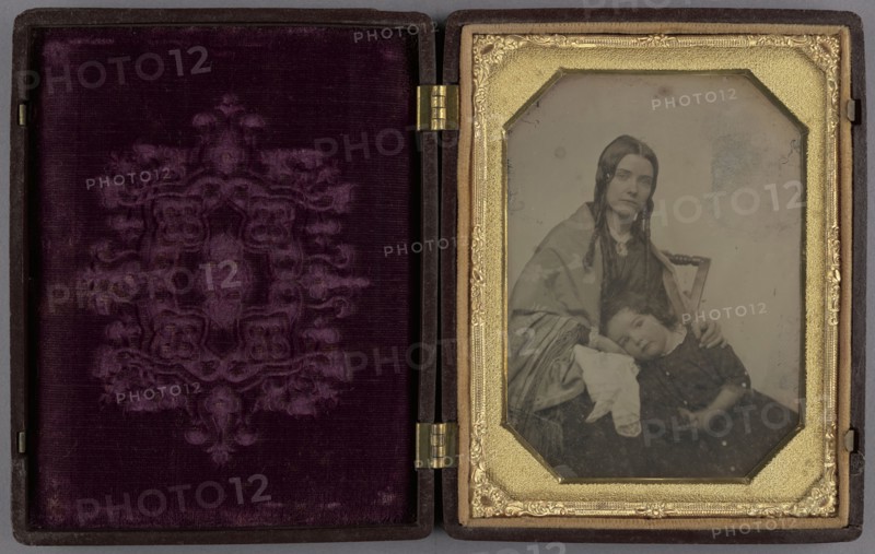Little girl resting her head in her seated mother's lap; American; 1840s; Daguerreotype