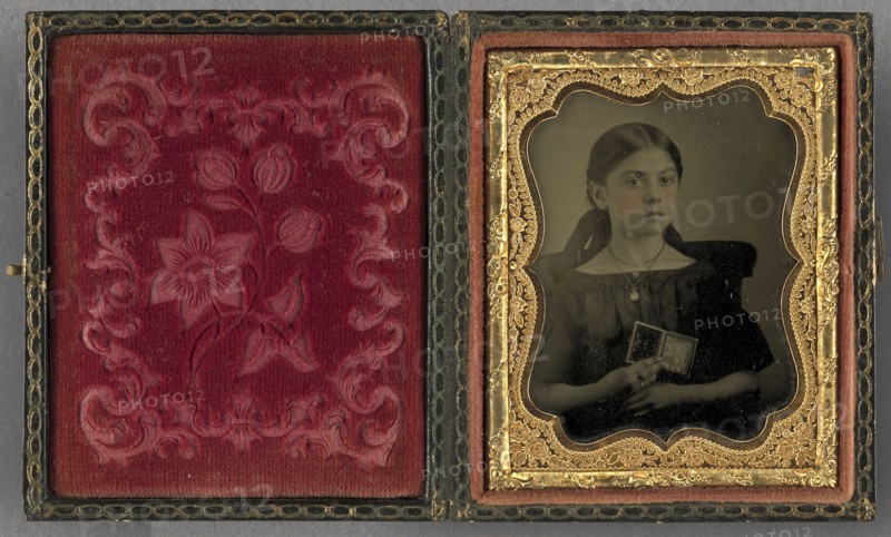 Portrait of a Seated Young Girl Wearing Locket Holding a Cased Object Portrait of a Man; George L. Williams American, born 1822