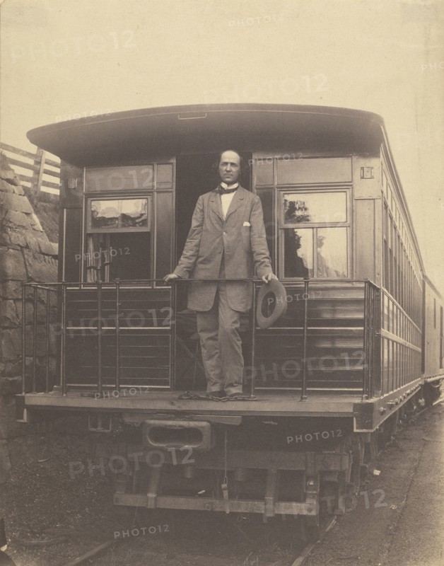 Portrait of an  man standing on rear platform of a train; American; about 1863; Salted paper print; 19.5 x 15.4 cm