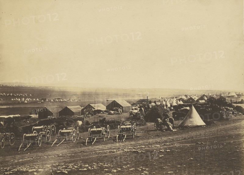 Artillery Wagons, Balaklava in the distance; Roger Fenton, English, 1819 - 1869, 1855; Salted paper print; 24.9 x 34.8 cm