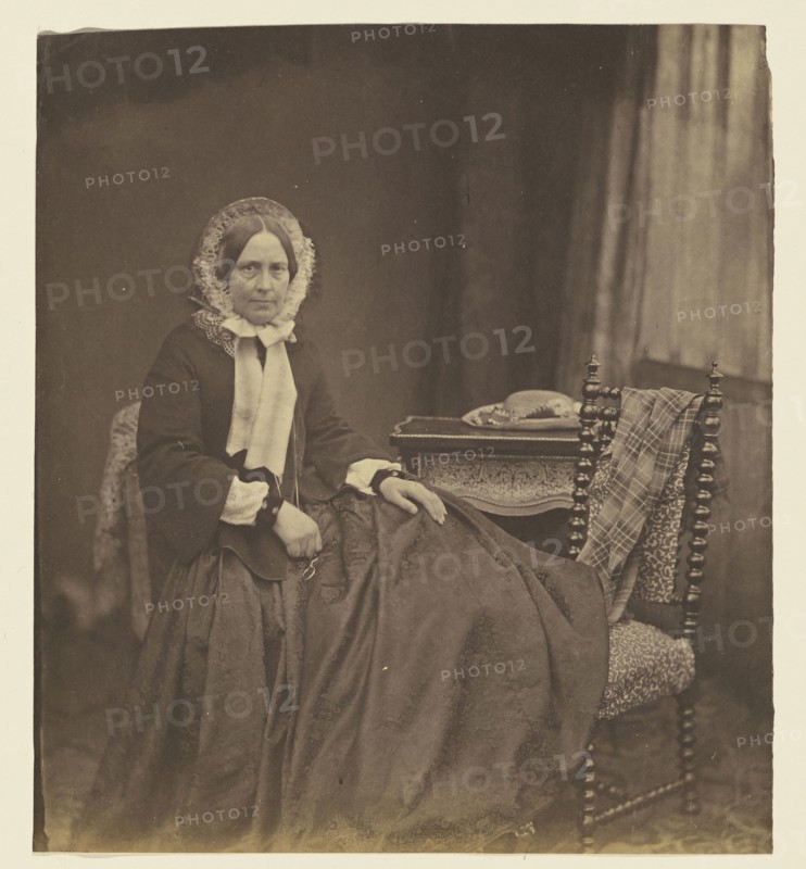 Portrait of a woman, wearing a bonnet, seated; Roger Fenton, English, 1819 - 1869, 1850s; Salted paper print; 25.1 x 22.4 cm