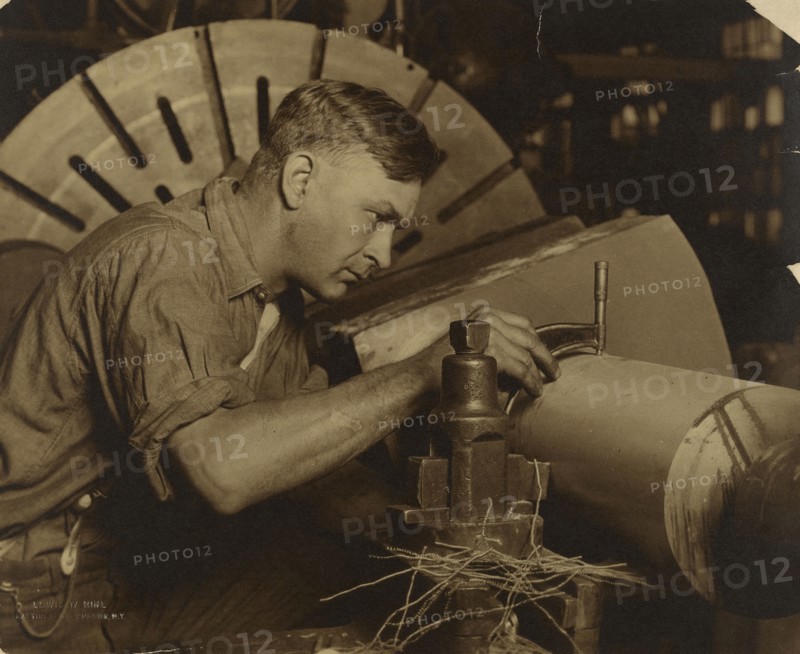 Man with Micrometer Measuring a Shaft to a Thousandth of an Inch; Lewis W. Hine, American, 1874 - 1940, United States