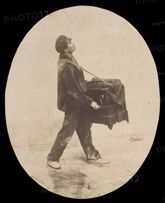 The Organ Grinder; André Adolphe-Eugène Disdéri, French, 1819 - 1889, about 1853; Salted paper print; 15 x 12.1 cm