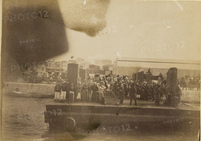 Group of people on barge; about 1860 - 1880; Tinted Albumen silver print