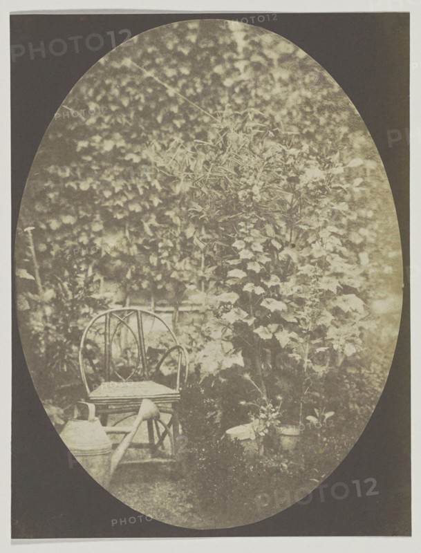 Chair and watering can in a garden; Hippolyte Bayard, French, 1801 - 1887, France; about 1843-1847; Salted paper print from a
