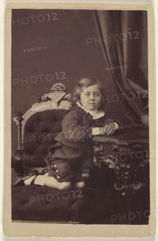 Boy wearing a Fauntleroy suit; about 1869; Carbon print
