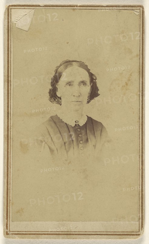 elder woman with wire-rimmed glasses in vignette style; J.W. Morris, American, active Adrian, Minnesota 1860s - 1870s, 1870s