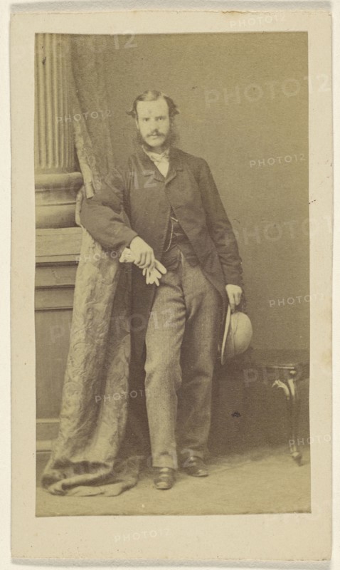 man with moustache & muttonchops, holding gloves in one hand, a hat in the other; F. Schwarzschild, British, active Calcutta