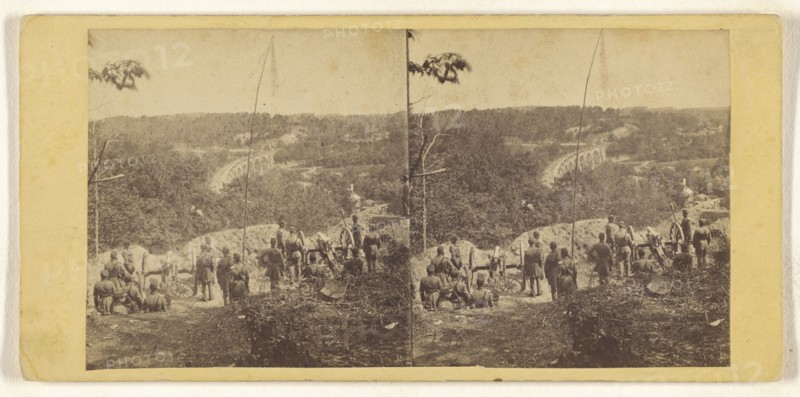 Group of Civil War soldiers overlooking a bridge; American; about 1862 - 1864; Albumen silver print