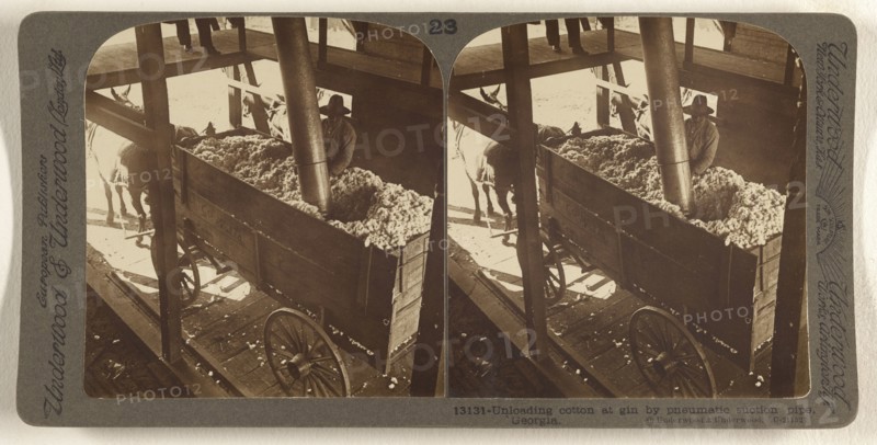 Unloading cotton at gin by pnematic suction pipe, Georgia; Underwood & Underwood, American, 1881 - 1940s, about 1900; Gelatin