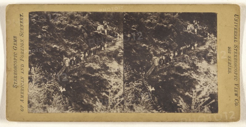 People walking down path of  glen; Universal Stereoscopic View Company; about 1880; Collotype