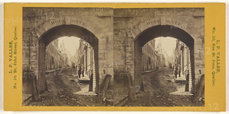 Holy Family Street, Looking Through Hope Gate; L.P. Vallée, Canadian, 1837 - 1905, active Quebéc, Canada, 1865 - 1873; Albumen