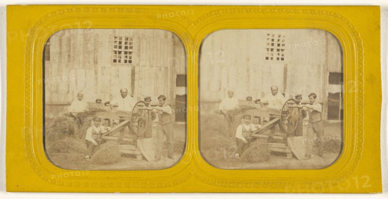Men working on hay chafing machine; about 1865; Hand-colored Albumen silver print