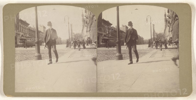 Elder white-bearded man with derby walking on Albany, N.Y. street; Julius M. Wendt, American, active 1900s - 1910s, 1900s
