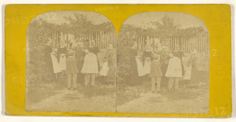 Group of people playing a game, one man is blindfolded; about 1855 - 1860; Albumen silver print