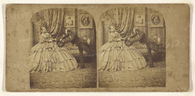 Genre: man trying to hold the hand of woman in hoop dress; about 1865; Albumen silver print
