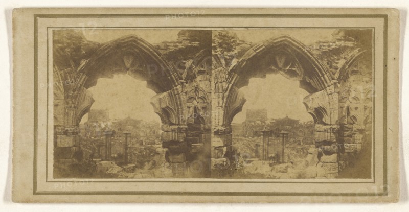 View of city through Gothic arch; 1855 - 1860; Albumen silver print