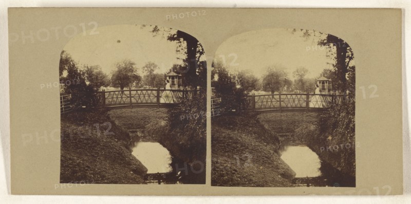 Woman crossing footbridge over stream; British; about 1860; Albumen silver print