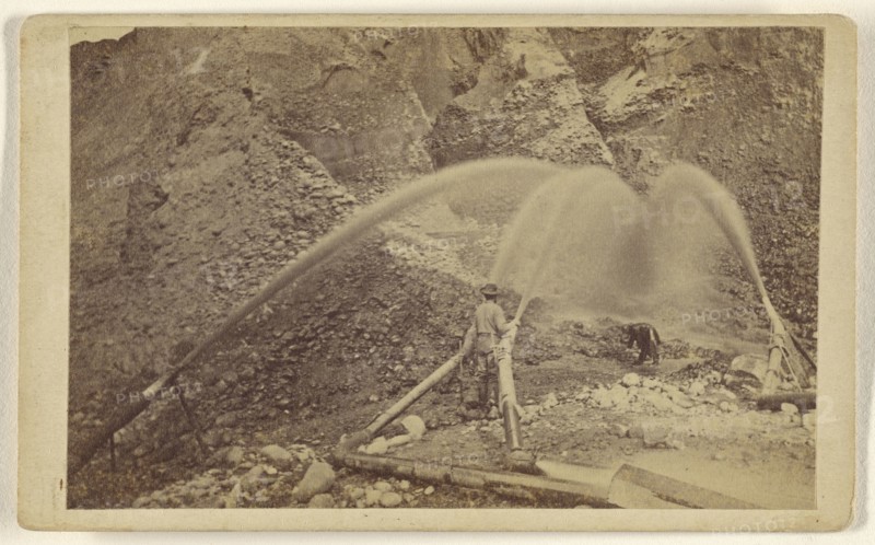 Hydraulic Mining - Behind the Pipes; Lawrence & Houseworth; about 1865; Albumen silver print
