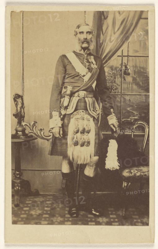bearded man with metals on chest, wearing kilt, standing; F.W. Baker, British, active Calcutta, India 1860s, 1860s; Albumen