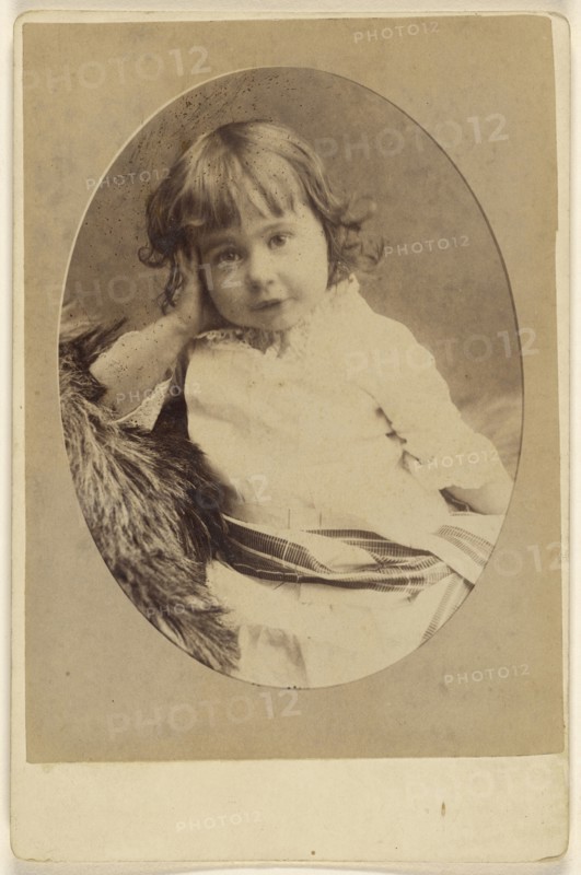 little girl with hand on head, printed in oval style; J. J. Abbott; about 1880; Albumen silver print
