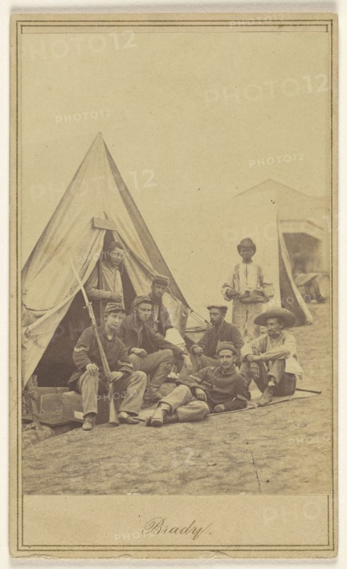Group of seven soldiers and one black servant at a campsite; Mathew B. Brady, American, about 1823 - 1896, about 1862; Albumen