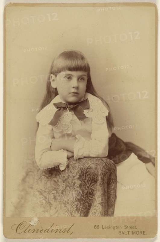 little girl posed against a chair back; Barnett M. Clinedinst, American, active 1870s - 1880s, about 1879; Albumen silver print