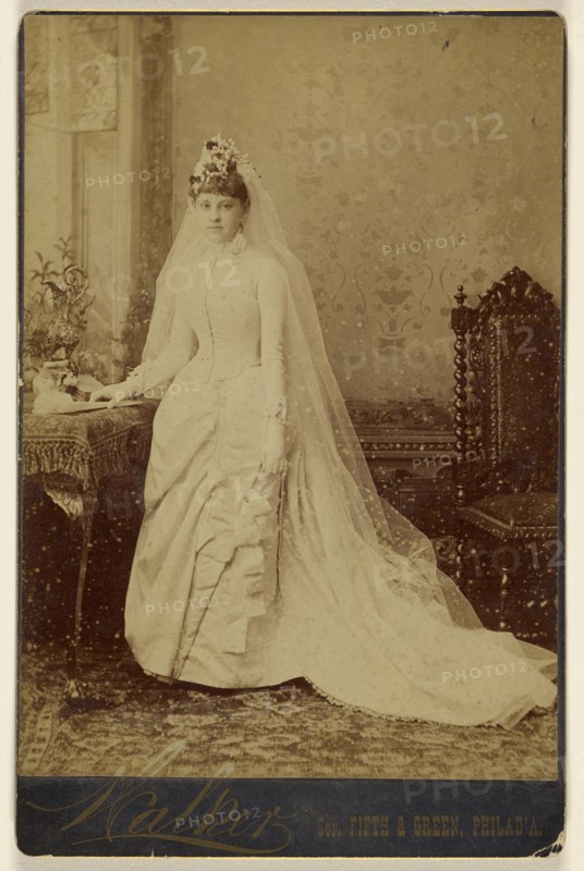 woman in wedding gown, standing; Walker; 1870s; Albumen silver print