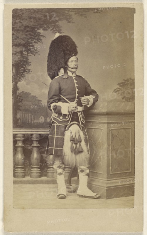 soldier in kilt and feathered bonnet; Porral, British, active Gibraltar 1860s, 1870s; Albumen silver print