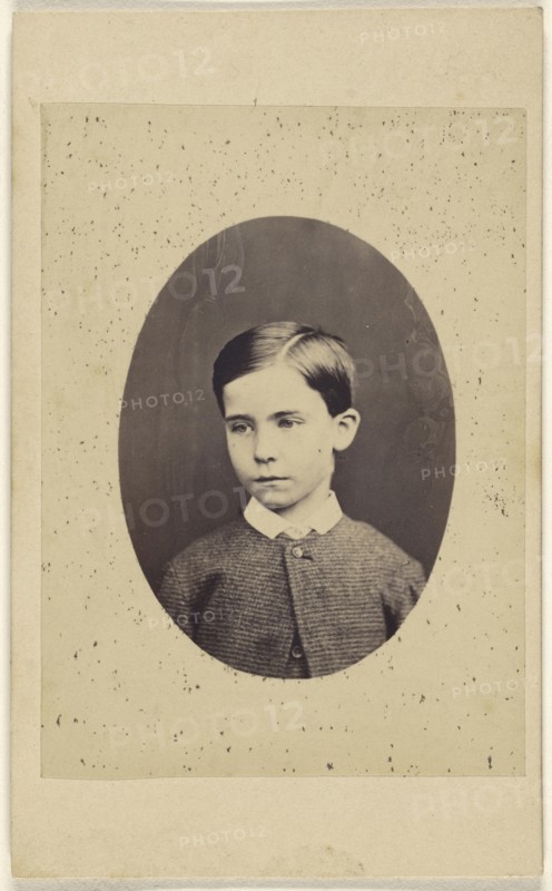 little boy, in quasi-oval style; about 1865; Albumen silver print