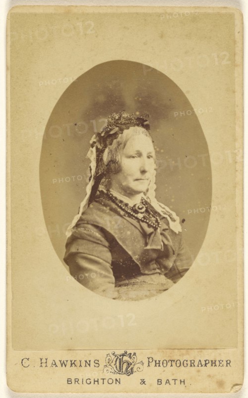 elderly woman, in oval format; C. Hawkins, British, active Brighton, England 1860s - 1870s, about 1865; Albumen silver print