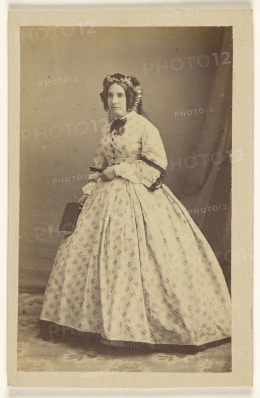 woman in white dress, standing; Bailly & Maurice; 1865 - 1870; Albumen silver print