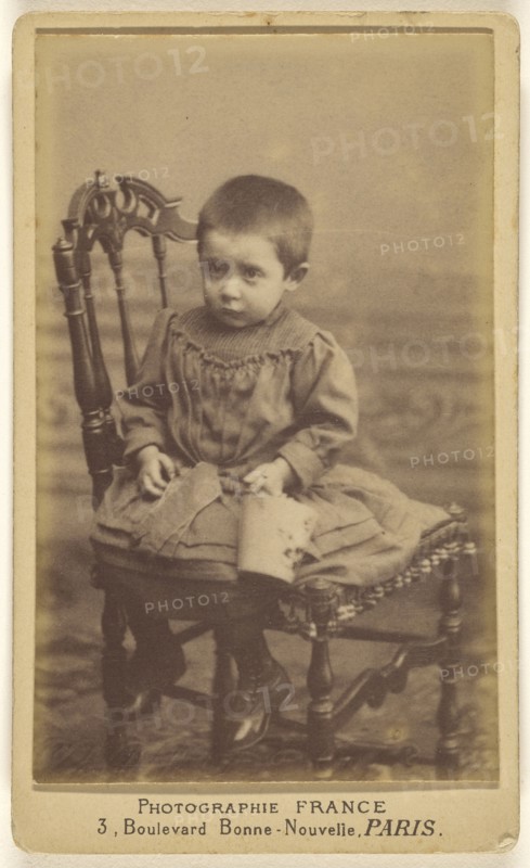girl with extremely short hair, seated; France, French, active Paris, France 1890s, 1891; Albumen silver print