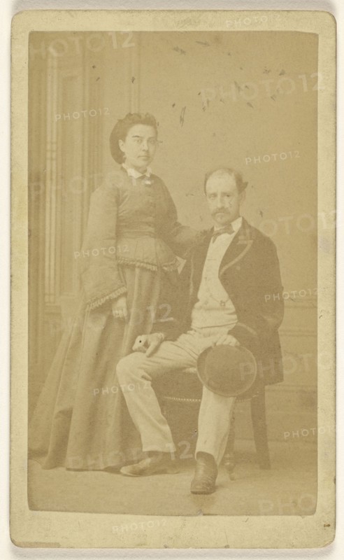 couple: woman, standing; man seated; Paul Bourgeois, French, active 1900s, about 1865; Albumen silver print