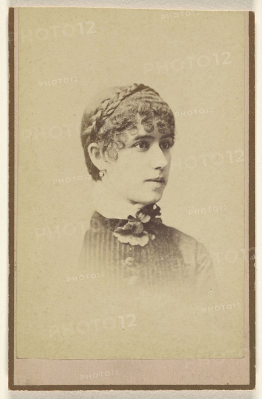 woman with curly hair, printed in vignette-style; Miller & Company; about 1880; Albumen silver print