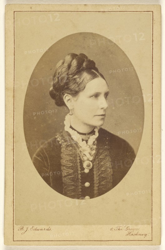 woman, in 3,4 profile, printed in oval style; B.J. Edwards, British, active 1860s, 1865 - 1870; Albumen silver print